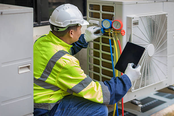 Professional Hvac technician working in Avon, MA
